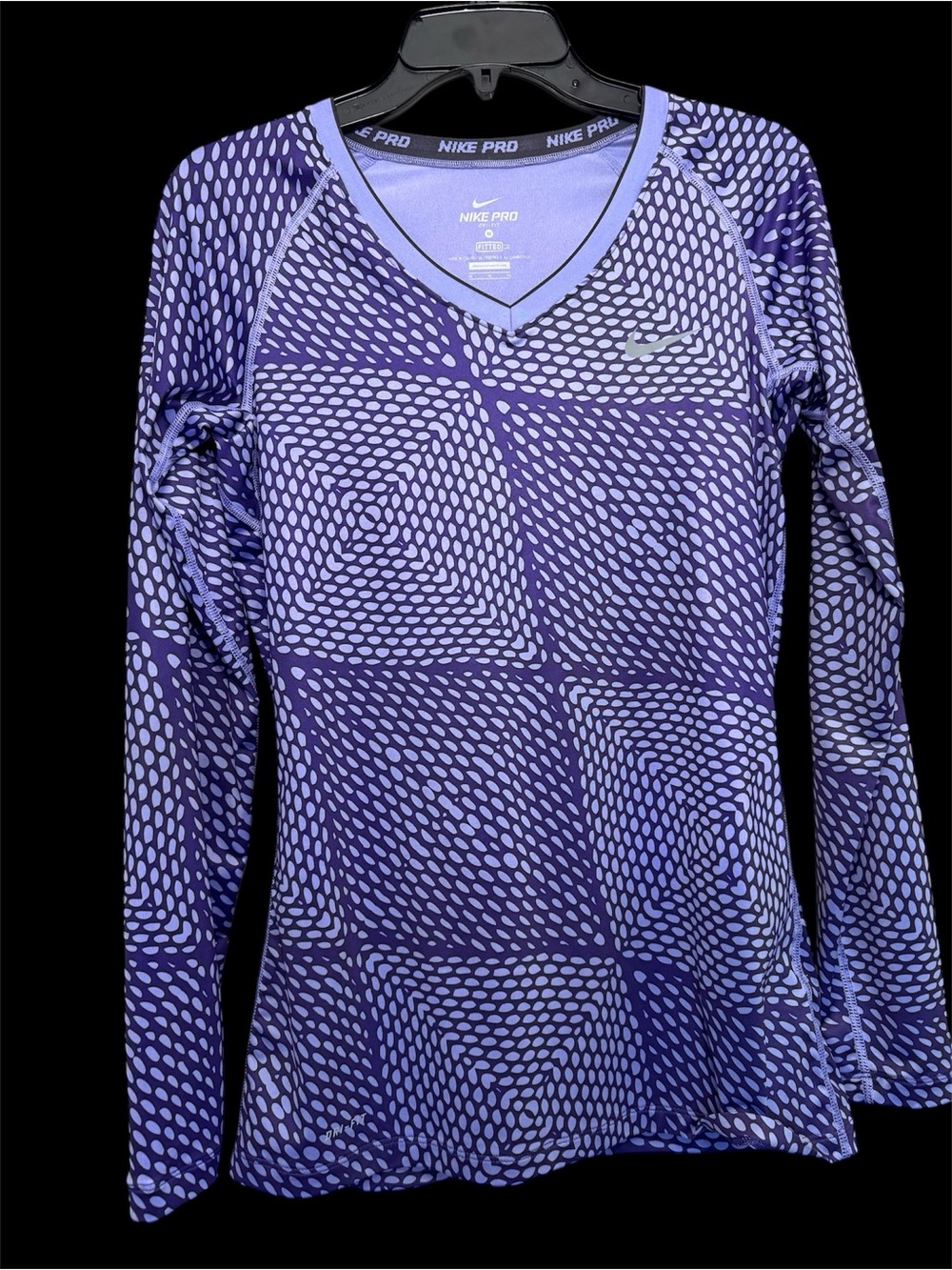 Nike Long Sleeve V-Neck dry fit fabric. Purple with geometric pattern. Size med.